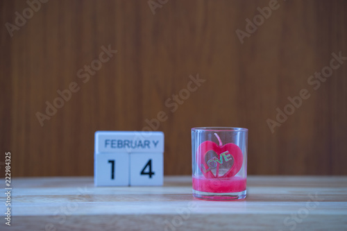 Heart Love in glass on blurred 14 february backgrournd, photo