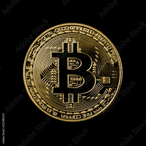 a bitcoin coin on black background
