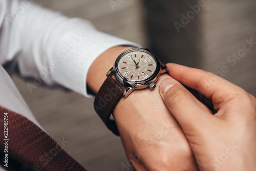 The watch on the man's hand