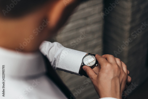 The watch on the man's hand
