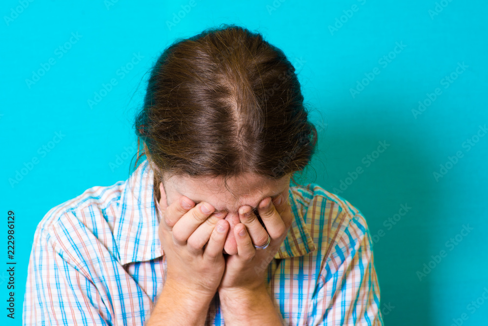 Fototapeta premium the young man is upset and crying