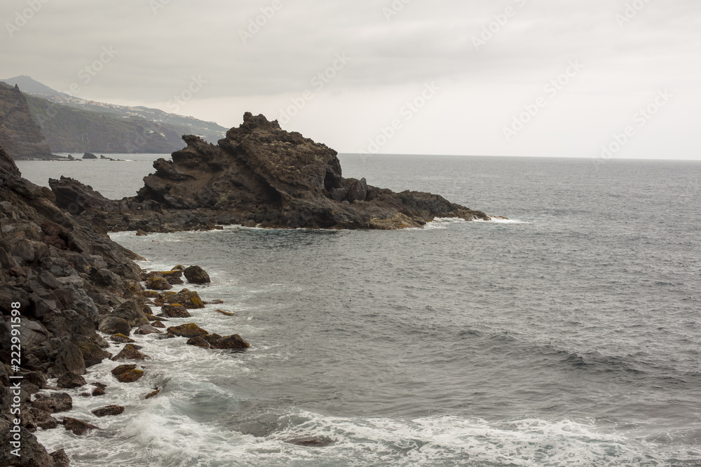 Rocks in a sea with waves