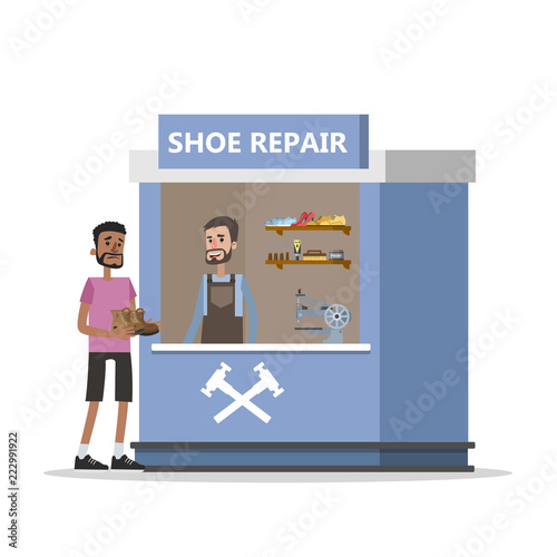 Man taking torn boots to the shoe repair service.