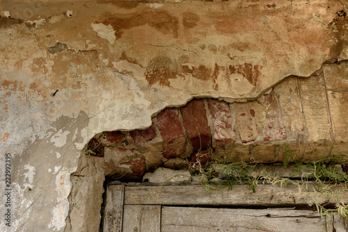 texture of old plaster and rusty metal