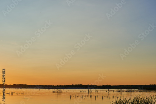 lake at sunset with beautiful clear sky