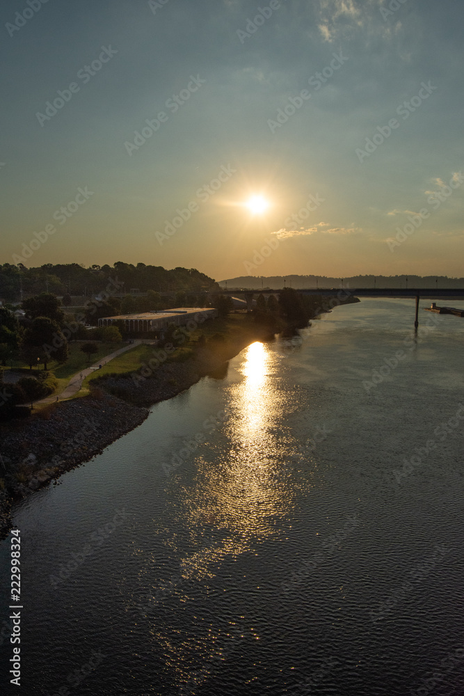 Early morning sunrise sun reflection on a river in Chattanooga, Tennessee
