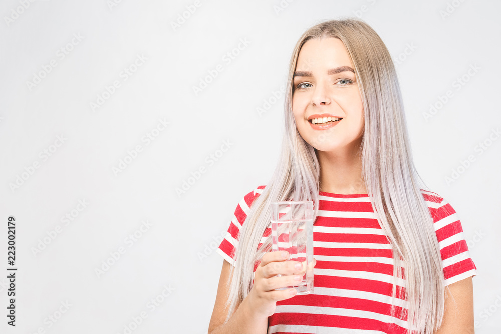 Face portrait of woman drinking water. Smiling girl. Isolated portrait. Face portrait of woman drinking water. Smiling girl. Isolated portrait.