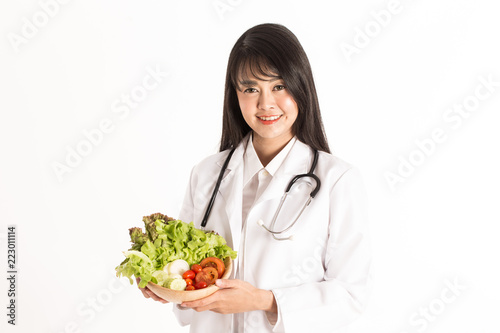 Asian Doctor woman smile and holding fresh vegetable salad for good health Isolated on white background