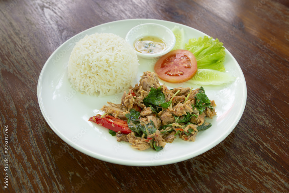 Tuna fried with basil and Cooked rice. Thai Food.