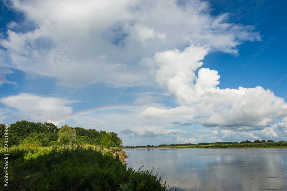 Oka river in summer Sunny day with rainbow