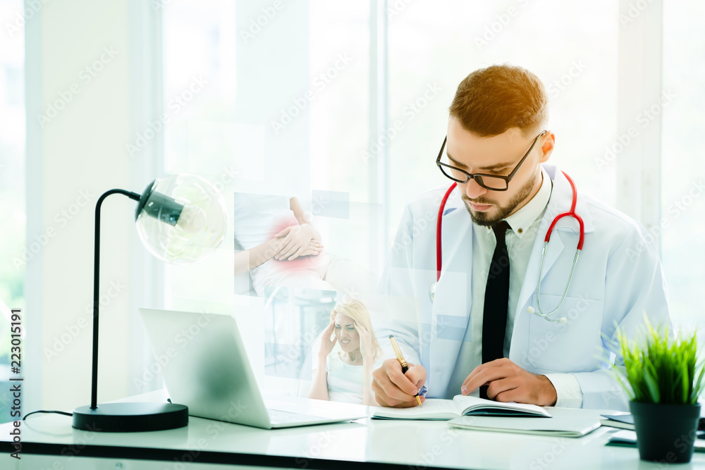 Doctor is reading the sick person. Analyzing the database in a hospital laptop. To keep the treatment properly. Modern treatment can provide advice through the internet. Concept Medical Hospital Doctor is reading the sick person. Analyzing the database in a hospital laptop. To keep the treatment properly. Modern treatment can provide advice through the internet. Concept Medical Hospital
