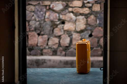 A single jerrycan on a porch, viewed through the doorway of a house in Nyamirambo, an outlying suburb of Kigali, Rwanda
