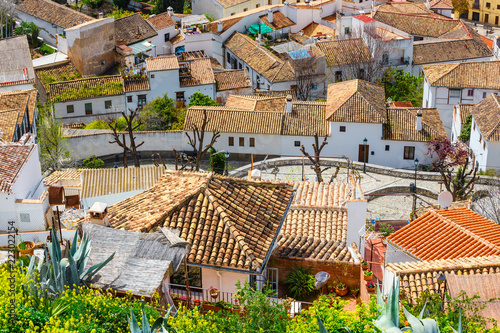 aerial view of Granada in a daytime. Granada is located at foot of Sierra Nevada Mountains, Andalusia, Spain.