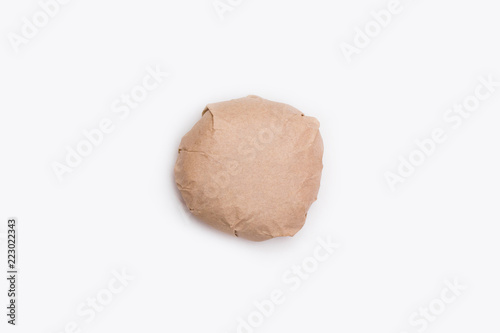 Burger, packed on a white background. Wrapped paper. Hamburger(mockup).Burger packed © sabir