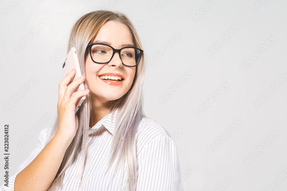 Woman with a cell phone. Isolated on white background.