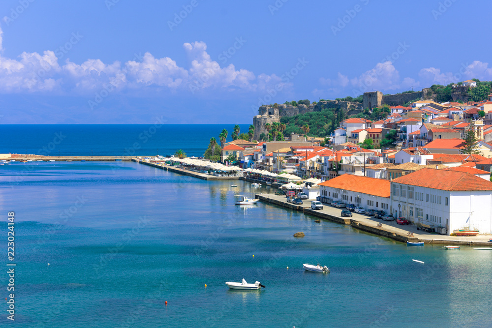 View of traditional fishing village of Koroni, Greece and its small harbour