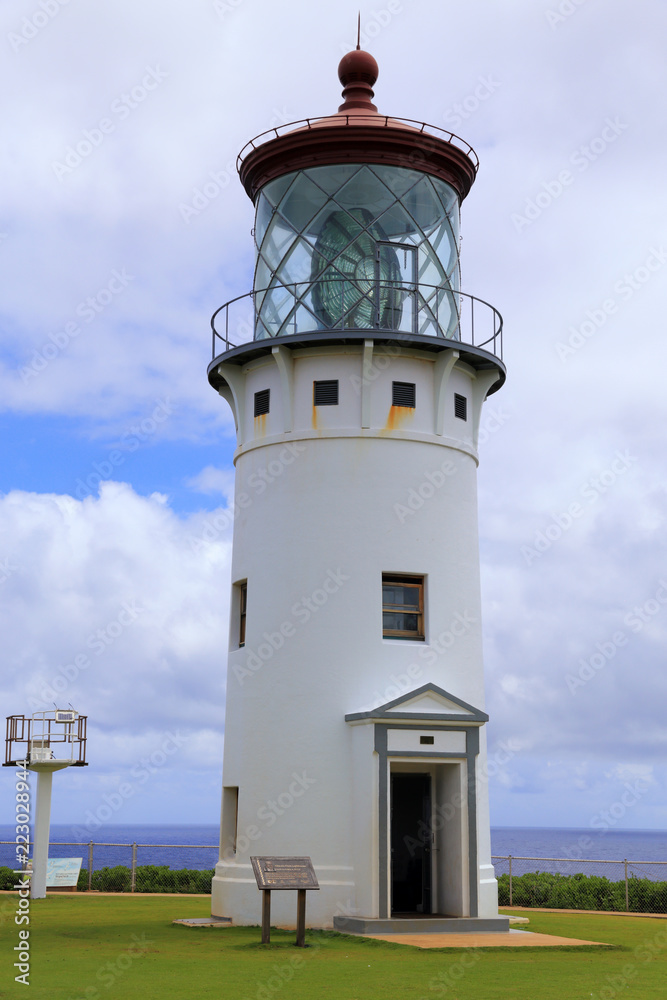 Lighthouse perched above the ocean