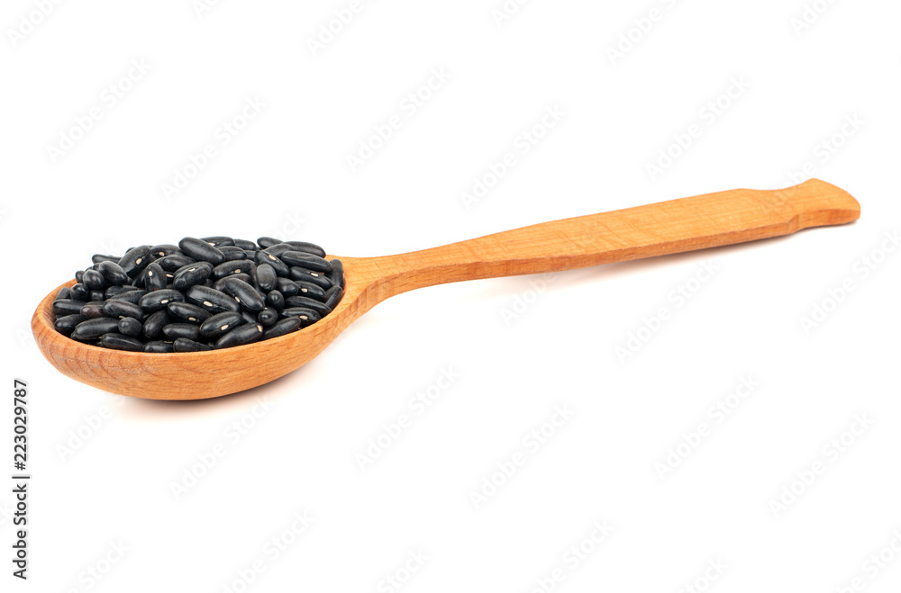 Black beans in spoon Black beans in spoon