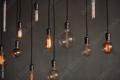 Set edison retro lamp on loft gray concrete background.