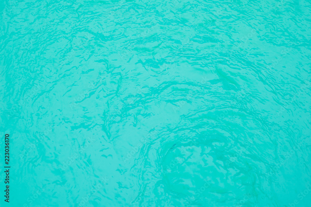 Surface of blue swimming pool, background of water in swimming pool.