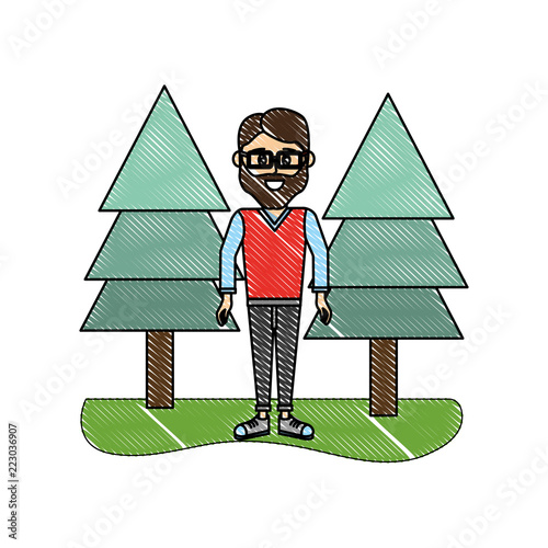 grated cute man with casual clothes and pine trees