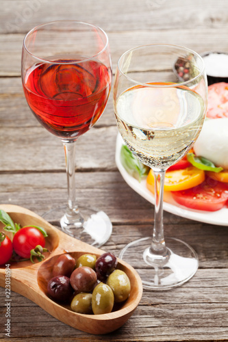White and rose wine with caprese salad