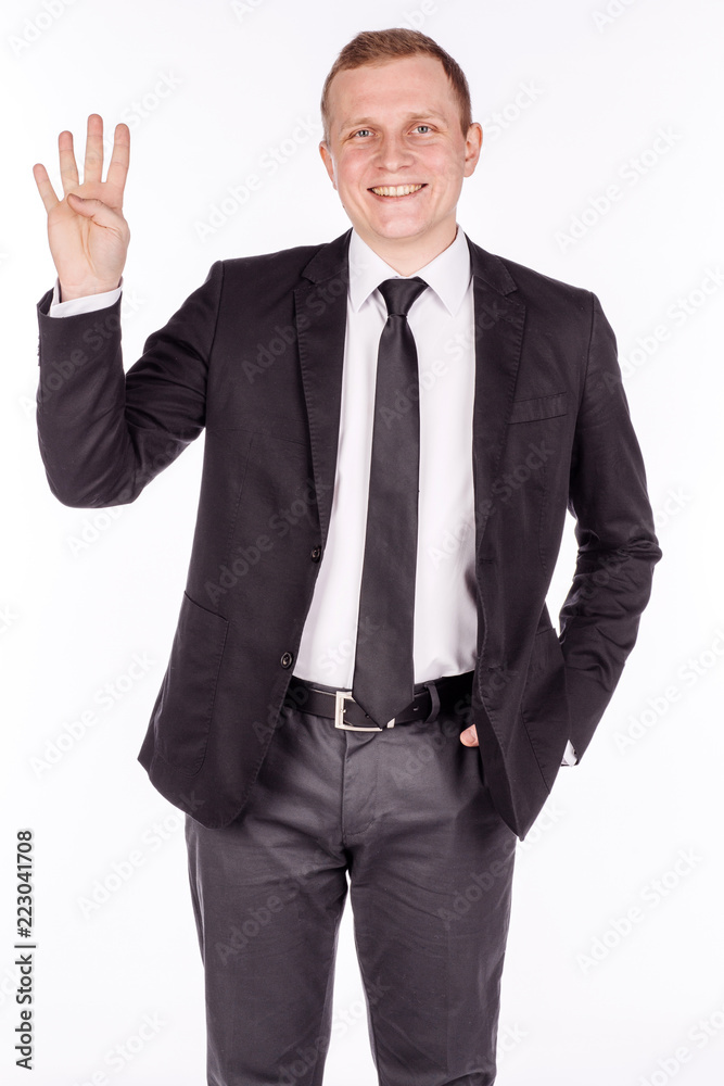 man in black suit making numbers sign gesture with hand fingers. emotions, facial expressions, feelings, body language, signs. man in black suit making numbers sign gesture with hand fingers. emotions, facial expressions, feelings, body language, signs.