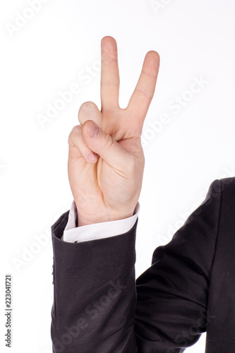 man's hand on white studio background. gesture number