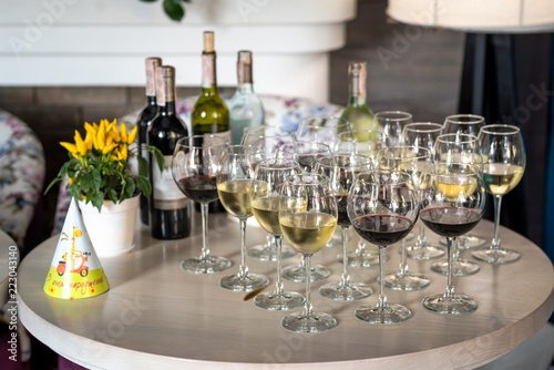 Festive table with glasses of wine photo