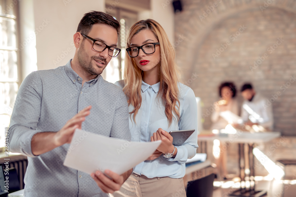 Fototapeta premium Happy business colleagues in modern office