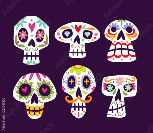 Colorful mexican skull collection. Cute cartoon sugar skulls isolated on purple background. Set 1 of 2. Vector illustration.