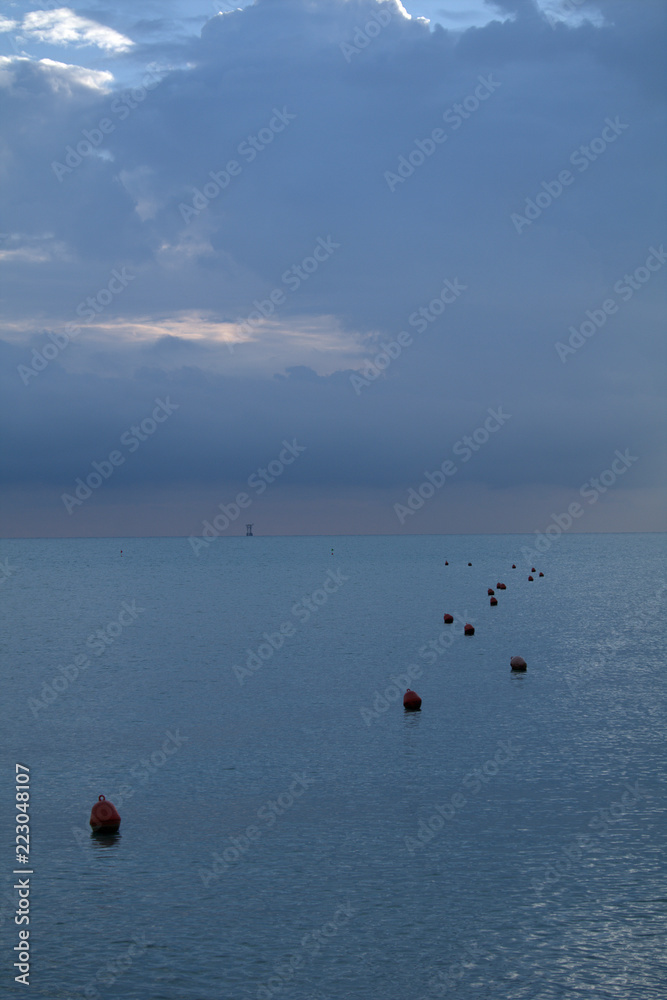 buoy,sea,horizon,cloudy,seascape,water,calm