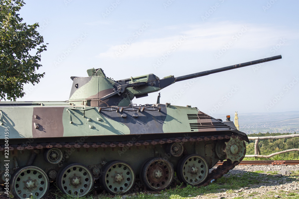 Heavy tank military vehicle with landscape background