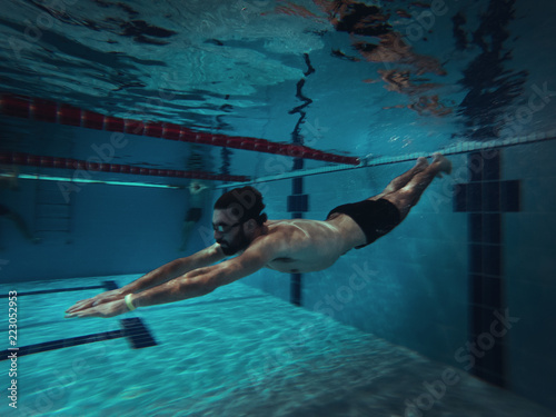 Swimmer in the Pool Underwater