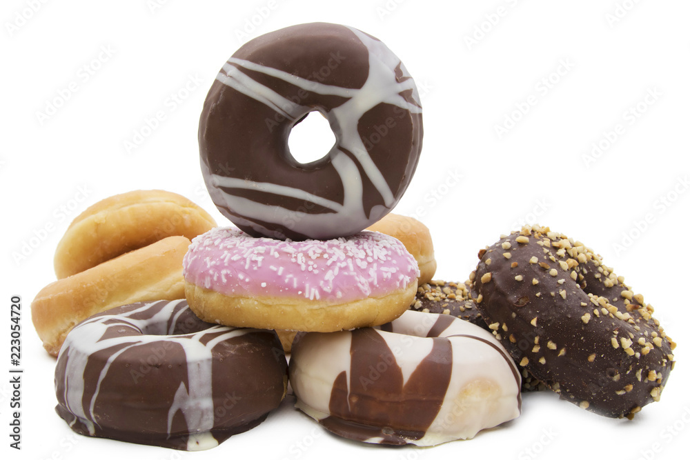varied donuts stacked and insulated in white background
