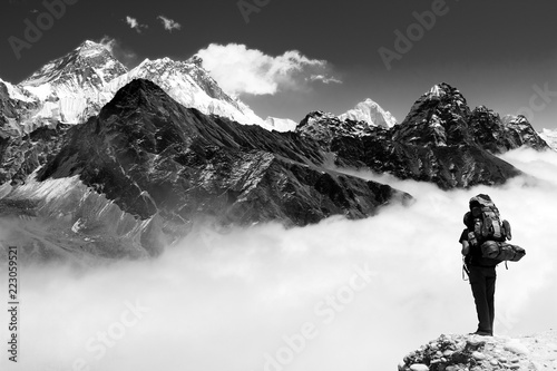 view of Everest from Gokyo with tourist photo