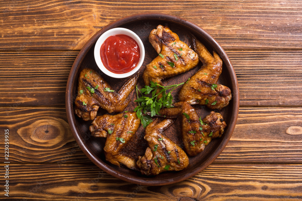 Grilled chicken wings with tomato sauce Grilled chicken wings with tomato sauce