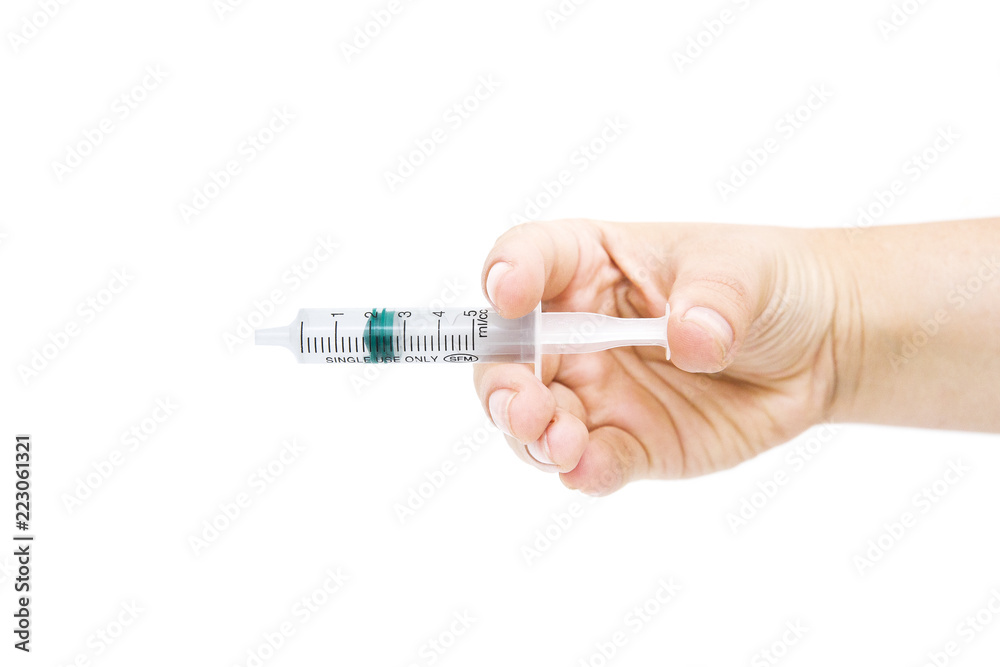 Fototapeta premium Hand with syringe on white background. Hand holding syringe