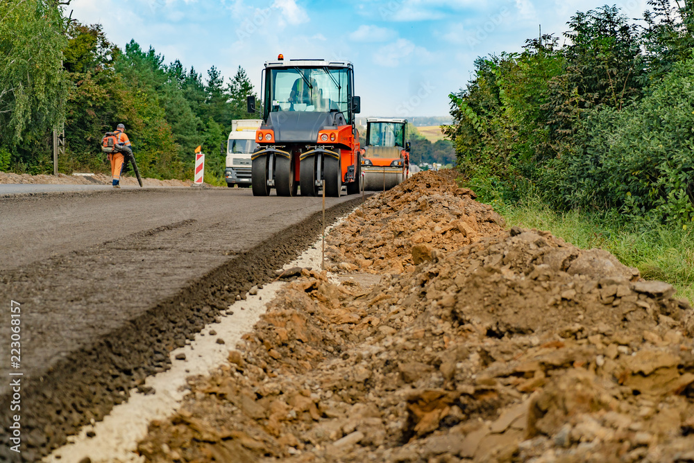 Fototapeta premium carrying out repair work with the help of special equipment for road works