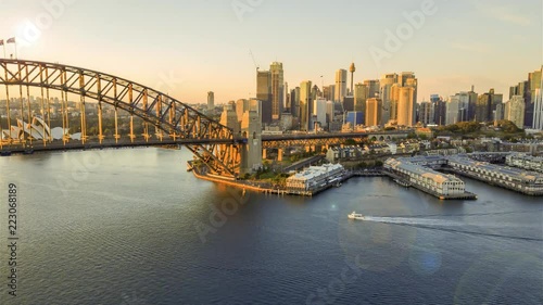 Wallpaper Mural 4k hyperlapse drone lapse of Sydney city skyline during sunrise. Aerial view with cinematic establishing shot and flare effect. Torontodigital.ca