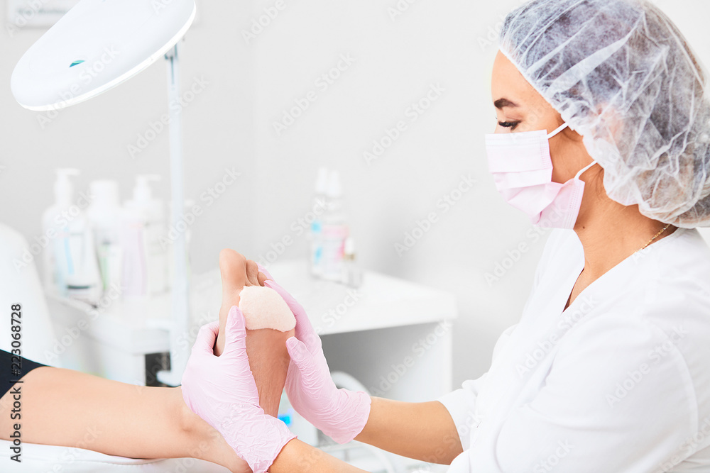 Patient on medical pedicure procedure visiting podiatrist.Podologic polymer gel plates.Protecting the skin ulceration.Bedsore prevention.Foot treatment in SPA salon.Podiatry clinic. - obrazy, fototapety, plakaty 