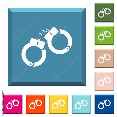 Handcuffs white icons on edged square buttons