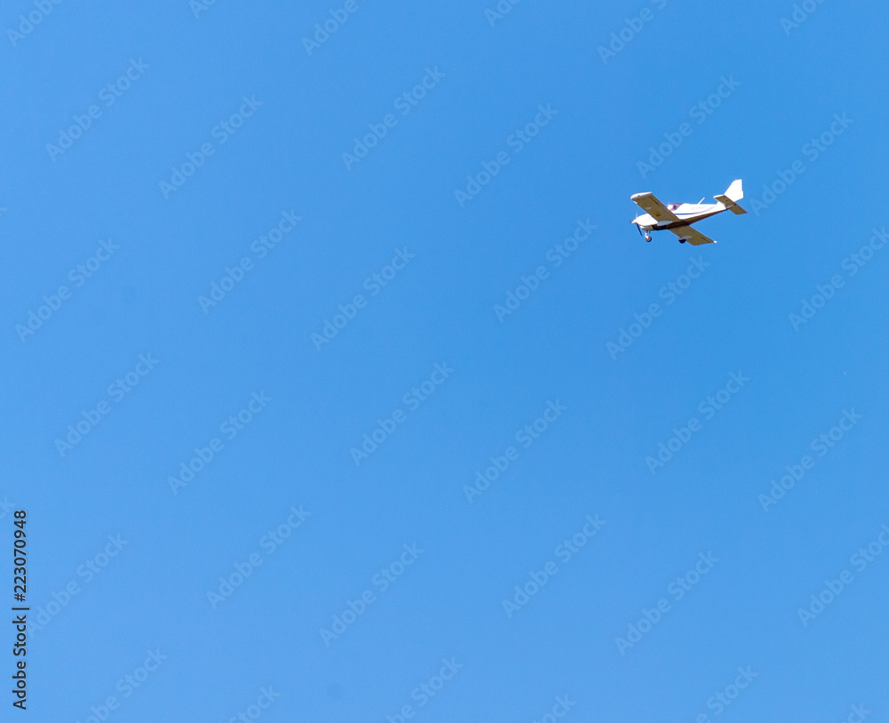 airplane against blue sky airplane against blue sky