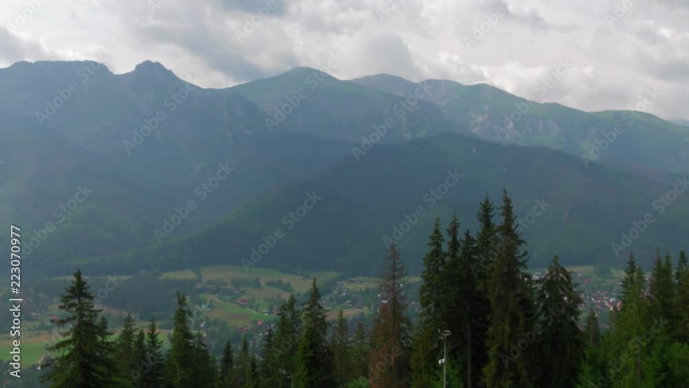 Poland,Zakopane, Mountains TATRY, Clouds. Trees and meadows. Sleeping knight and cross at Giewont. Sunrise. Rocks. Dangerous place. Panning camera, Pan, Closeup Poland,Zakopane, Mountains TATRY, Clouds. Trees and meadows. Sleeping knight and cross at Giewont. Sunrise. Rocks. Dangerous place. Panning camera, Pan, Closeup