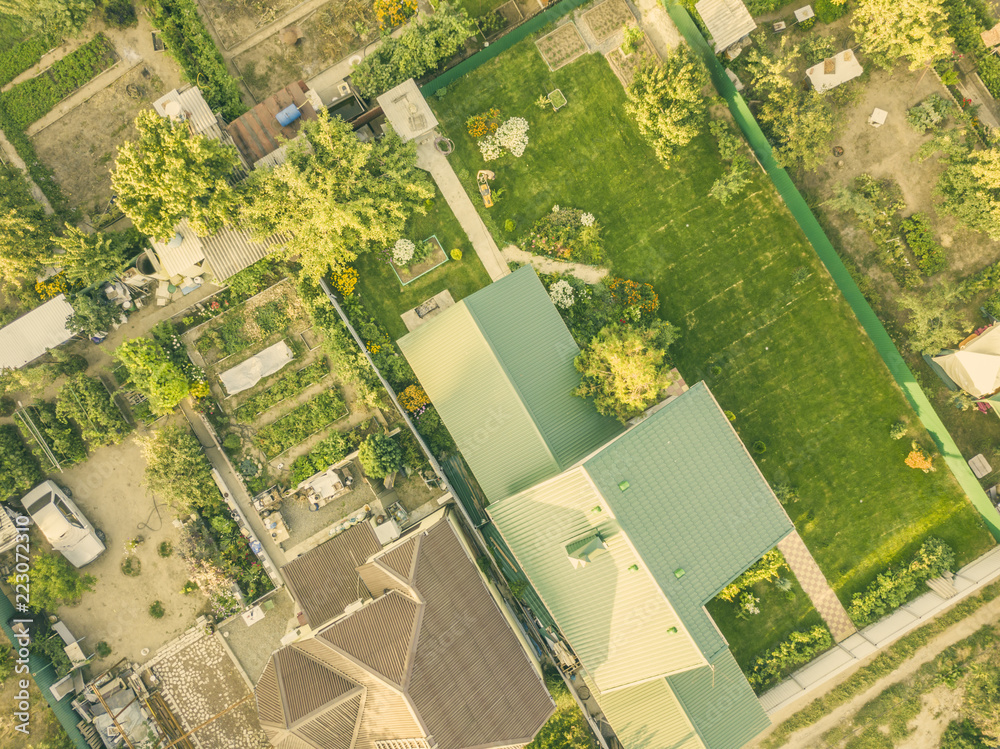 Fototapeta premium aerial drone view of summer cottage villa from above f