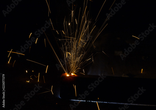 Flash and sparks from electric welding