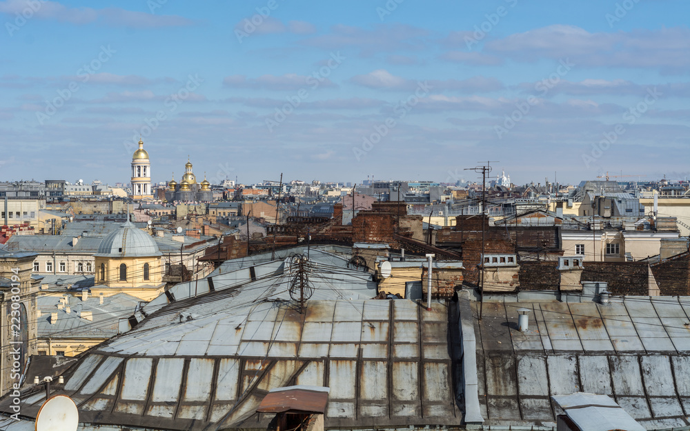 Saint Petersburg, Russia - April 2018: View of the city from the roof of old houses in historical downtown at sunny day