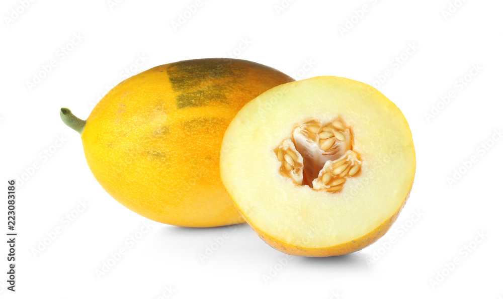 Whole and piece of ripe tasty melons on white background