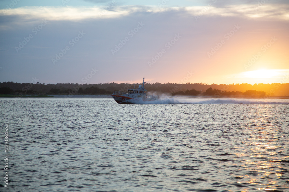 Coast Guard Cutter at Sunset