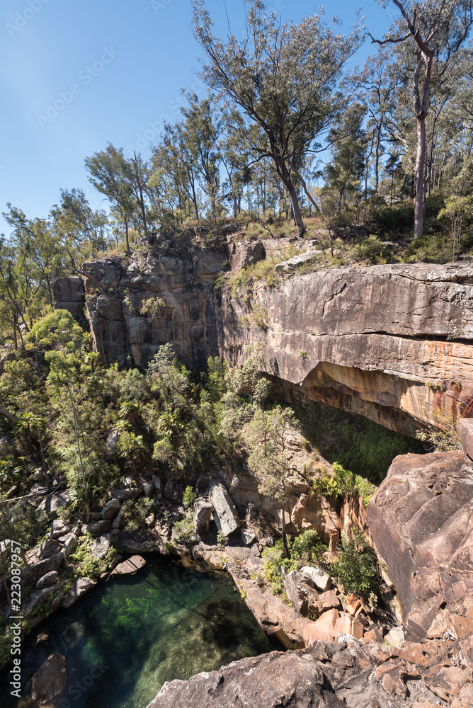 View from the top of the virtually dry waterfall at the top of Rainbow Waters (Gudda Gumoo) gorge in Blackdown Tableland National Park, Queensland, Australia.